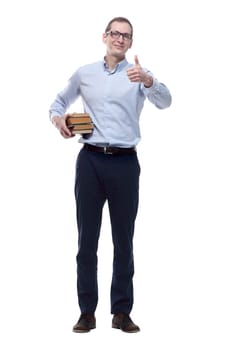 in full growth. a confident man with a stack of books pointing at you. isolated on a white