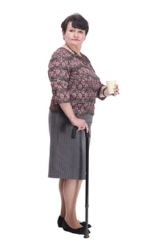 full-length. casual elderly woman with takeaway coffee. isolated on a white background.