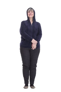 full-length. casual elderly woman in a comfortable autumn jacket looking at you . isolated on a white background.