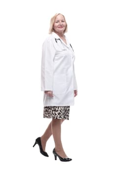 woman doctor in a white coat striding forward. isolated on a white background.