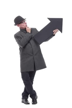 intelligent man in a hat pointing in the direction. isolated on a white background.