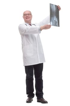 full-length. mature doctor in a white coat striding forward .isolated on a white background.