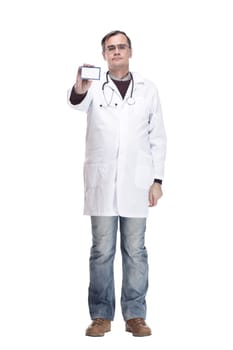 full-length. qualified doctor showing his visiting card. isolated on a white background.