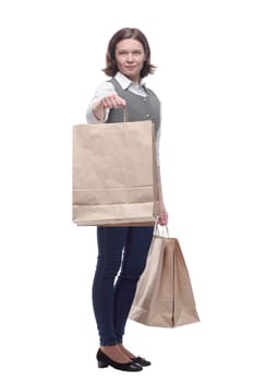 casual mature woman with shopping bags . isolated on a white background.