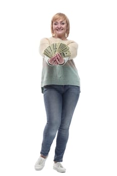 attractive casual woman with a fan of banknotes. isolated on a white background.