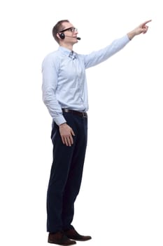 in full growth. a smiling man in a headset looking at you. isolated on a white background