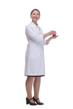 in full growth. medical woman with a laboratory flask. isolated on a white background.