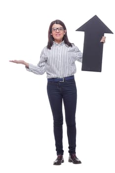 Beautiful business woman holding a black direction arrow sign, over a white background. Concept of the choice