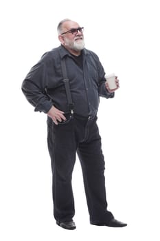 full- length . a successful older man drinks takeaway coffee. isolated on a white background.