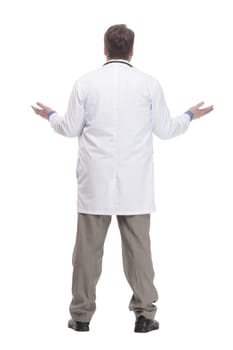 in full growth. friendly doctor in a white coat.isolated on a white background