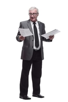 in full growth. Mature business man with a digital tablet. isolated on a white background.