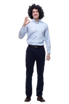 in full growth. confident curly-haired man . isolated on a white background