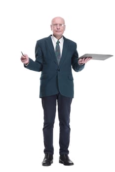 in full growth. serious business man with glasses taking notes on the clipboard. isolated on a white background.