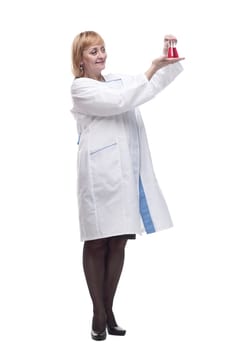 in full growth. smiling woman scientist with a laboratory flask. isolated on a white background.