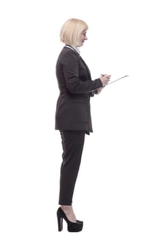 in full growth. confident business woman with a clipboard. isolated on a white background.