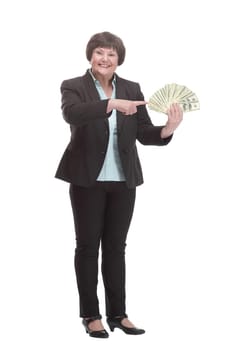 Mature business woman with a bundle of banknotes . isolated on a white background.