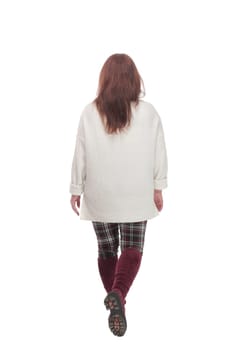 full-length. woman in casual clothes walking forward .isolated on a white background.