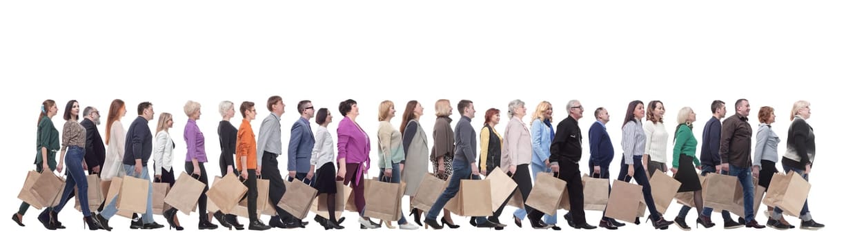 a group of people stand in line with shopping bags. isolated on white