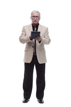 in full growth. Mature intelligent man with a calculator. isolated on a white background.