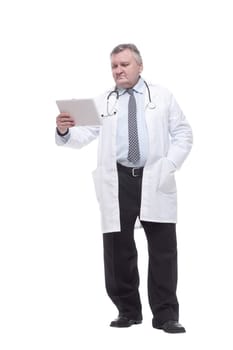 in full growth.competent doctor with clipboard. isolated on a white background.