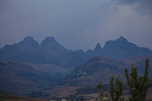 A cloudy sunset at Cathedral Peak in the Drakensberg Mountains. KwaZulu-Natal Province, South Africa