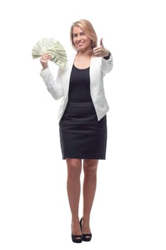 in full growth. businesswoman with a large wad of bills. isolated on a white background.