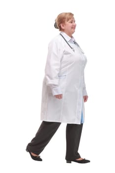 Full length back view of a health care worker standing isolated over white background and looking away