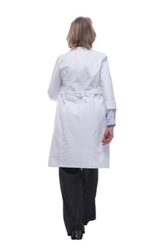 Doctor in clean uniform walking on white background. Concept of emergency