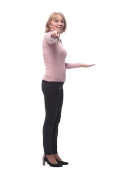 Side view of happy smiling business woman or real estate agent showing keys from new house, isolated over white background