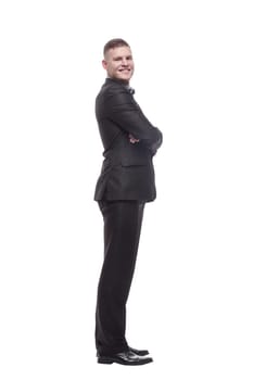 in full growth. handsome young businessman. isolated on a white background.