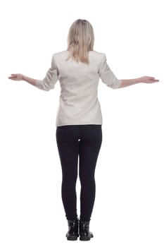 back view. casual woman in a white jacket looking at a white screen. isolated on a white background.