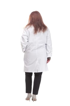 full-length. mature female doctor with stethoscope . isolated on a white background.