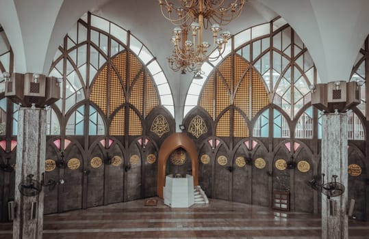 Bangkok, Thailand - Jul 28, 2023 - Architecture design inside the Foundation of the Central Mosque and Islamic Center of Thailand. Detail of interior building built for Islamic Affairs are designed with elegant, Islamic art concept. Religion Islam, Muslim mosque, Islamic mosque, Space for text, Selective focus.