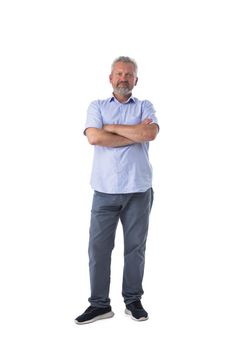 Middle aged man wearing shirt and jeans standing with Arms Folded isolated on white background