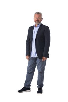 Portrait of a happy mature man isolated over a white background, full length