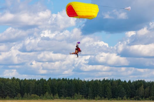 Jump in tandem skydivers-athletes with a parachute. Kirzhach Russia July 22, 2023