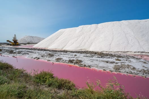Pink Ponds In Man-made Salt Evaporation Pans In Camargue, Salin de Guiraud, France. High quality photo