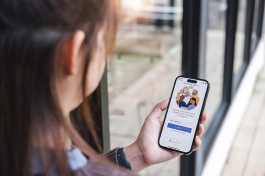 CHIANG MAI, THAILAND - JUL 7 2023 : A working from home employee is downloading the Microsoft Teams social platform, ready for remote working in isolation from home.