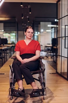 A modern young businesswoman in a wheelchair is surrounded by an inclusive workspace with glass-walled offices, embodying determination and innovation in the business world.