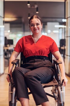 A modern young businesswoman in a wheelchair is surrounded by an inclusive workspace with glass-walled offices, embodying determination and innovation in the business world.