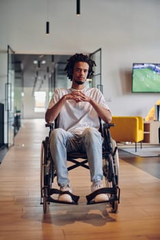 A businessman in a wheelchair occupies a hallway within a modern startup coworking center, embodying inclusivity and determination in the business environment.