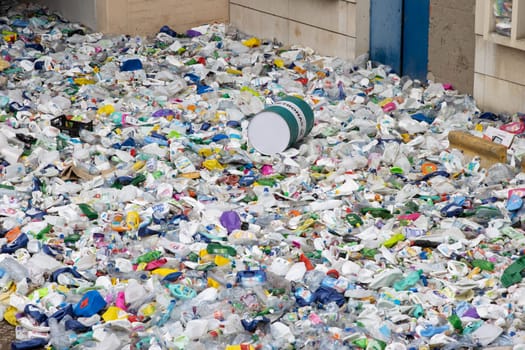16 october 2022 Almada, Portugal: garbage dump full of empty plastic bottles. Mid shot