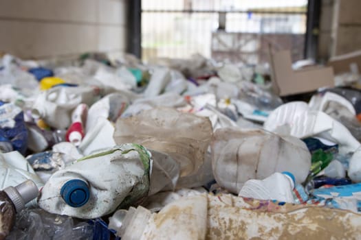 16 october 2022 Almada, Portugal: recyclable landfill - problem of plastic garbage pollution of the environment. Mid shot