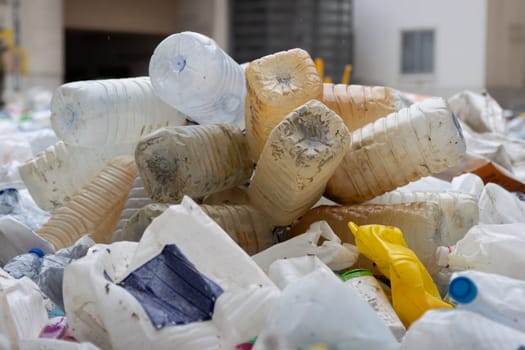 16 october 2022 Almada, Portugal: a bunch of large plastic bottles in a recyclable landfill. Mid shot