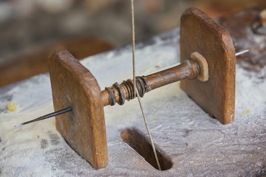 Vintage machine for stone processing at the Viking Festival in Denmark.