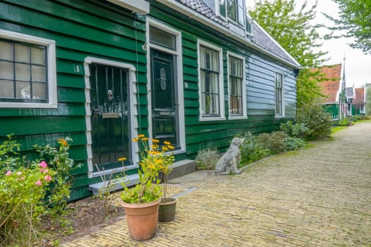 Netherlands. Summer day at the Zaanse Schans. Facade of a typical rural wooden house