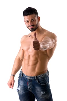 A shirtless man giving a thumbs up