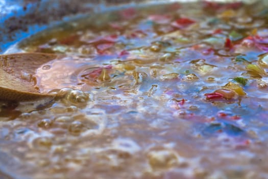 Baked sausages in traditional Croatian dish kotlovina.