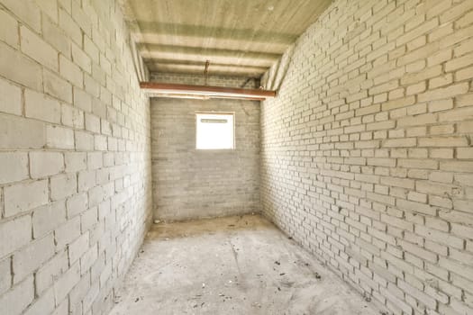 the inside of a building with brick walls and concrete flooring in place to be used for construction or other purposes