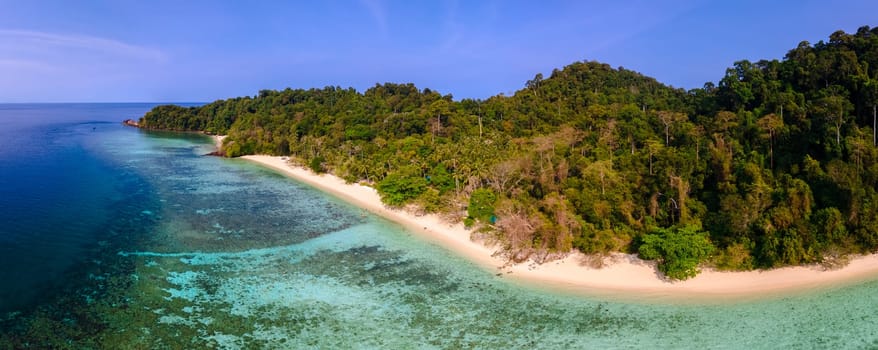 view at the tropical beach of Koh Kradan island in Thailand, aerial view over Koh Kradan Island Trang voted in 2023 as the nr 1 beach in the world